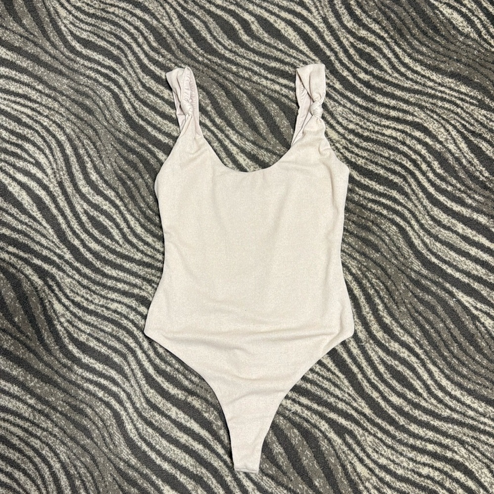 For love and lemons tan medium thong bodysuit in great condition!